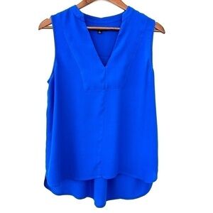 Madewell tank top with v-neckline, loose fitting, high low hemline
